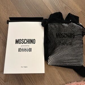 New moschino x wolford net tights